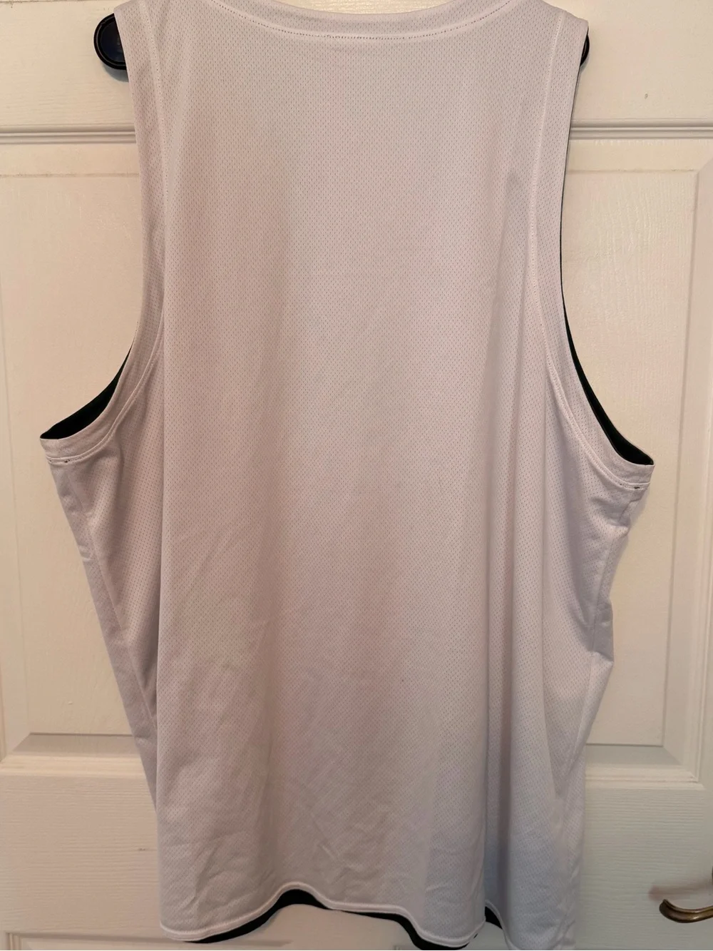 Reversible Nike Jordan Dark Green And White Basketball Tank.